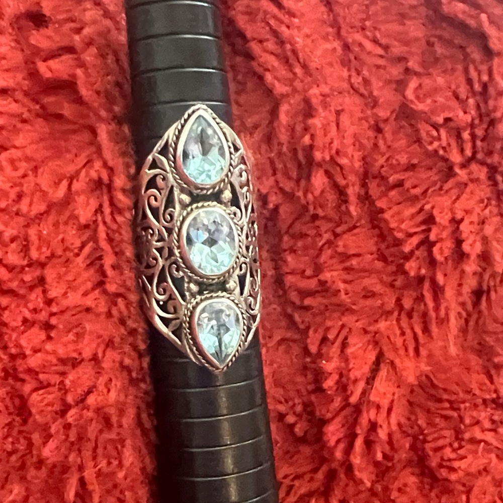 Sterling Silver Filigree Ring with Light Blue topaz stones